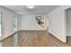 Spacious living room with hardwood floors, neutral walls, and staircase at 2530 Ashbourne Dr, Lawrenceville, GA 30043