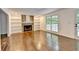 Cozy living room featuring a fireplace, built-in bookshelves, and hardwood floors at 2530 Ashbourne Dr, Lawrenceville, GA 30043