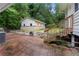 Outdoor space with brick patio and detached structure; great for entertaining or storage at 3664 Pin Oak Cir, Atlanta, GA 30340