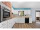 Kitchen showcasing white cabinets, stainless steel oven, and sleek black appliances at 3664 Pin Oak Cir, Atlanta, GA 30340