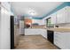 Kitchen featuring stainless steel appliances, white cabinets, and modern finishes at 3664 Pin Oak Cir, Atlanta, GA 30340