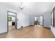 Inviting living room featuring beautiful hardwood floors, and an open view of the kitchen at 3664 Pin Oak Cir, Atlanta, GA 30340
