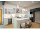 Modern kitchen featuring white cabinetry, a center island, and stainless steel appliances at 4366 Bradley Sw Dr, Snellville, GA 30039
