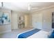 Bright main bedroom with a ceiling fan, multiple closets, and neutral toned walls at 4366 Bradley Sw Dr, Snellville, GA 30039