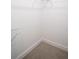White walk-in closet with carpet flooring and wire shelving at 4366 Bradley Sw Dr, Snellville, GA 30039