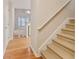 Inviting entryway with hardwood floors and staircase leading to the upper level at 184 Darbys Crossing Ct, Hiram, GA 30141