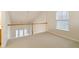 Loft area features railing overlooking the front door and a large window at 184 Darbys Crossing Ct, Hiram, GA 30141