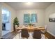 Dining room features hardwood flooring and natural lighting at 2046 Rector Sw Dr, Atlanta, GA 30311