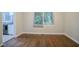 Cozy dining area with hardwood floors and view to kitchen at 2046 Rector Sw Dr, Atlanta, GA 30311