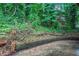 Exterior shot of natural landscape with some concrete and brick structures at 2046 Rector Sw Dr, Atlanta, GA 30311