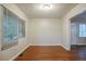 Bright, empty room with hardwood floors, fresh paint and ample natural light at 2046 Rector Sw Dr, Atlanta, GA 30311