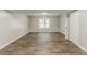 Finished basement area offers new floors, neutral paint, window, and closet at 2218 Lowtrail Ct, Lithonia, GA 30058