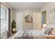 This staged bedroom includes playful decor, gray accents and a large window at 2218 Lowtrail Ct, Lithonia, GA 30058