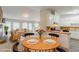 Open-concept living space with a dining area that connects to the kitchen, creating a harmonious flow at 2218 Lowtrail Ct, Lithonia, GA 30058