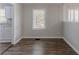 Bright dining room featuring wood-look flooring and natural light from the window at 2239 Carey Se Dr, Atlanta, GA 30315