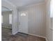 Bright entryway featuring a white door, complementing the neutral wall paneling at 2239 Carey Se Dr, Atlanta, GA 30315