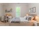Staged bedroom featuring decor, desk, and plentiful natural light at 2378 Randall Ave, Lithonia, GA 30058