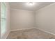 Neutral bedroom featuring carpet and natural light from window at 2378 Randall Ave, Lithonia, GA 30058