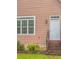 Home exterior with white door and steps at 2378 Randall Ave, Lithonia, GA 30058