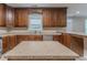 Well-equipped kitchen with dark wood cabinets, ample counter space, and modern stainless steel appliances at 2378 Randall Ave, Lithonia, GA 30058