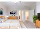Spacious main bedroom featuring doorways to bathrooms at 2378 Randall Ave, Lithonia, GA 30058