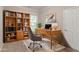 Bright and airy home office featuring built-in shelving and a comfortable workspace at 2378 Randall Ave, Lithonia, GA 30058