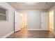 This bedroom features wood floors and a door leading to an en-suite bathroom at 2817 Burton Nw Rd, Atlanta, GA 30311