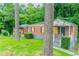 Picture of a single-story red brick home with a front porch at 2817 Burton Nw Rd, Atlanta, GA 30311