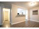 Unfurnished living room features neutral colors, and modern gray floors at 2817 Burton Nw Rd, Atlanta, GA 30311