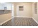 Unfurnished living room features neutral colors, and modern gray floors at 2817 Burton Nw Rd, Atlanta, GA 30311
