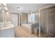 Bright bathroom with a soaking tub, glass enclosed shower, and double vanity at 3725 Paces Park Se Cir, Smyrna, GA 30080