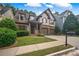 Charming two-story home with manicured lawn, brick accents, and a welcoming front porch at 3725 Paces Park Se Cir, Smyrna, GA 30080