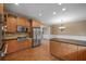 Bright kitchen with stainless steel appliances, wood cabinets, and an open layout at 3725 Paces Park Se Cir, Smyrna, GA 30080