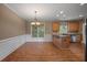 View of kitchen area with countertop bar and stainless steel appliances and chandelier at 3725 Paces Park Se Cir, Smyrna, GA 30080