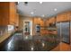 Kitchen with stainless steel appliances, granite counters, and custom wood cabinetry at 3725 Paces Park Se Cir, Smyrna, GA 30080