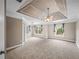 Expansive main bedroom with tray ceiling, neutral carpet and plentiful natural light at 3725 Paces Park Se Cir, Smyrna, GA 30080