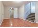 Finished basement area featuring tiled flooring and stairway to the upper level of the home at 5218 Tina Ct, Stone Mountain, GA 30083