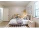 Cozy staged bedroom designed for a , complete with toys and comfortable bedding at 5218 Tina Ct, Stone Mountain, GA 30083