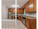 Traditional kitchen with stainless steel appliances and wooden cabinetry at 5218 Tina Ct, Stone Mountain, GA 30083