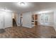 Open floor plan with staircase, kitchen, and dining area with french doors at 5218 Tina Ct, Stone Mountain, GA 30083
