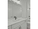 Beautiful bathroom with large mirror and quartz countertop at 2012 Ripple Park Bend, Canton, GA 30114