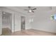 Bright bedroom with hardwood floors, recessed lighting and a door to the primary bathroom at 2012 Ripple Park Bend, Canton, GA 30114
