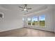 Bright bedroom with hardwood floors, large windows, and elegant tray ceilings at 2012 Ripple Park Bend, Canton, GA 30114