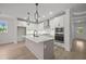 Spacious kitchen featuring a large island, stainless steel appliances, and ample cabinet space at 2012 Ripple Park Bend, Canton, GA 30114