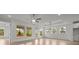 Bright living room featuring modern lighting, large windows, and an open-concept design at 2012 Ripple Park Bend, Canton, GA 30114