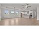 Open-concept space featuring hardwood floors, recessed lighting, and a modern kitchen at 2012 Ripple Park Bend, Canton, GA 30114
