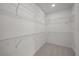 Spacious walk-in closet with ample shelving for organized storage at 2012 Ripple Park Bend, Canton, GA 30114