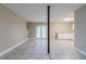 Large basement area with tiled floor, kitchenette, and access to outside at 2654 Laurel View Dr, Snellville, GA 30039