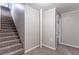 Carpeted stairs leading to the basement area with fresh paint at 2654 Laurel View Dr, Snellville, GA 30039