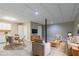 Finished basement area featuring kitchenette, living area, and dining space at 2654 Laurel View Dr, Snellville, GA 30039
